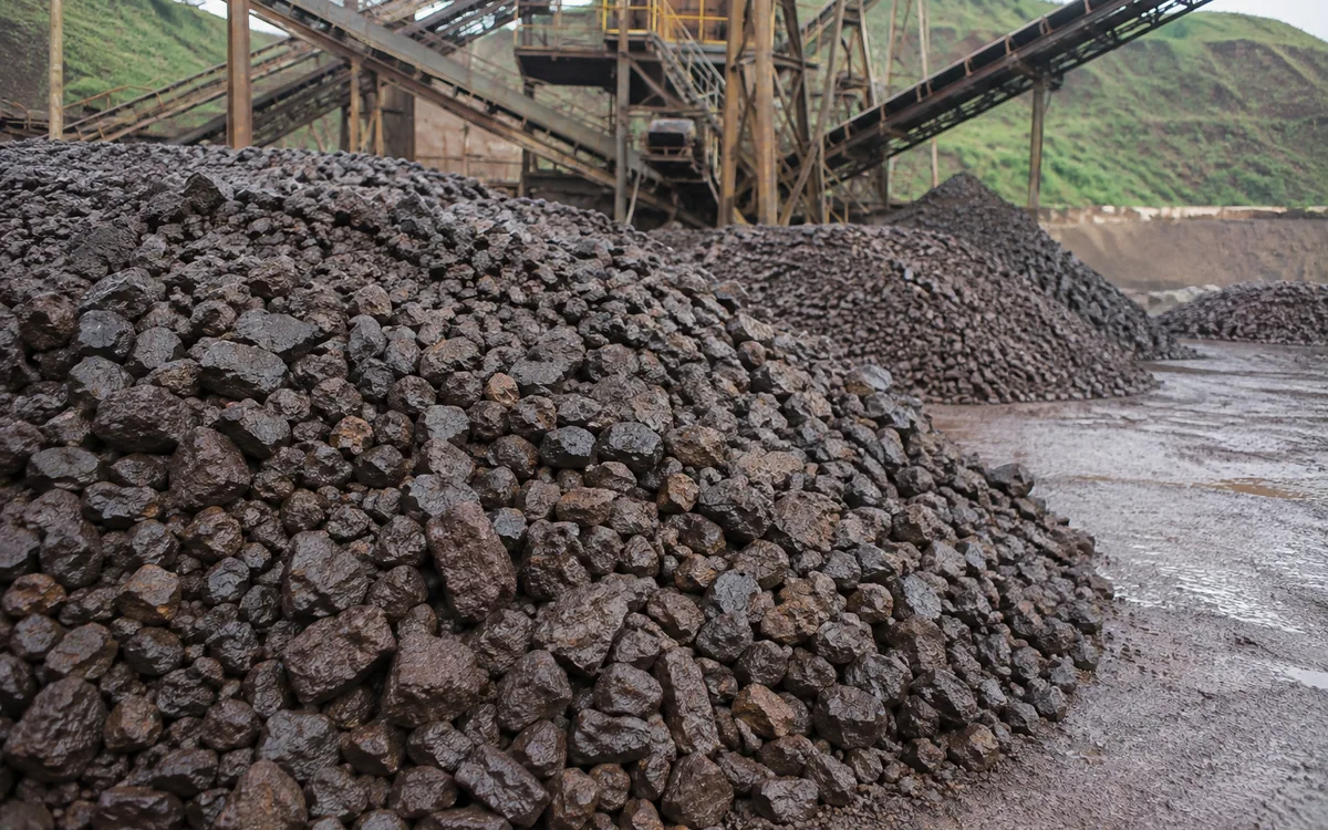 Stockpile of crushed iron ore at a processing plant